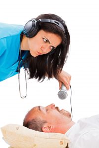 Doctor recording snoring