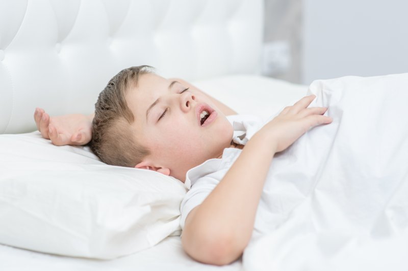 a young boy asleep